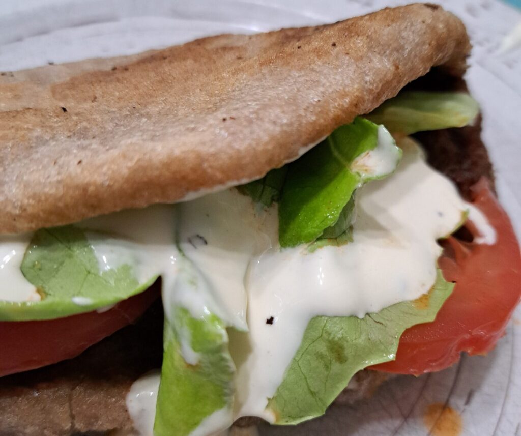 gluten-free sourdough discard flatbread with falafel sandwich